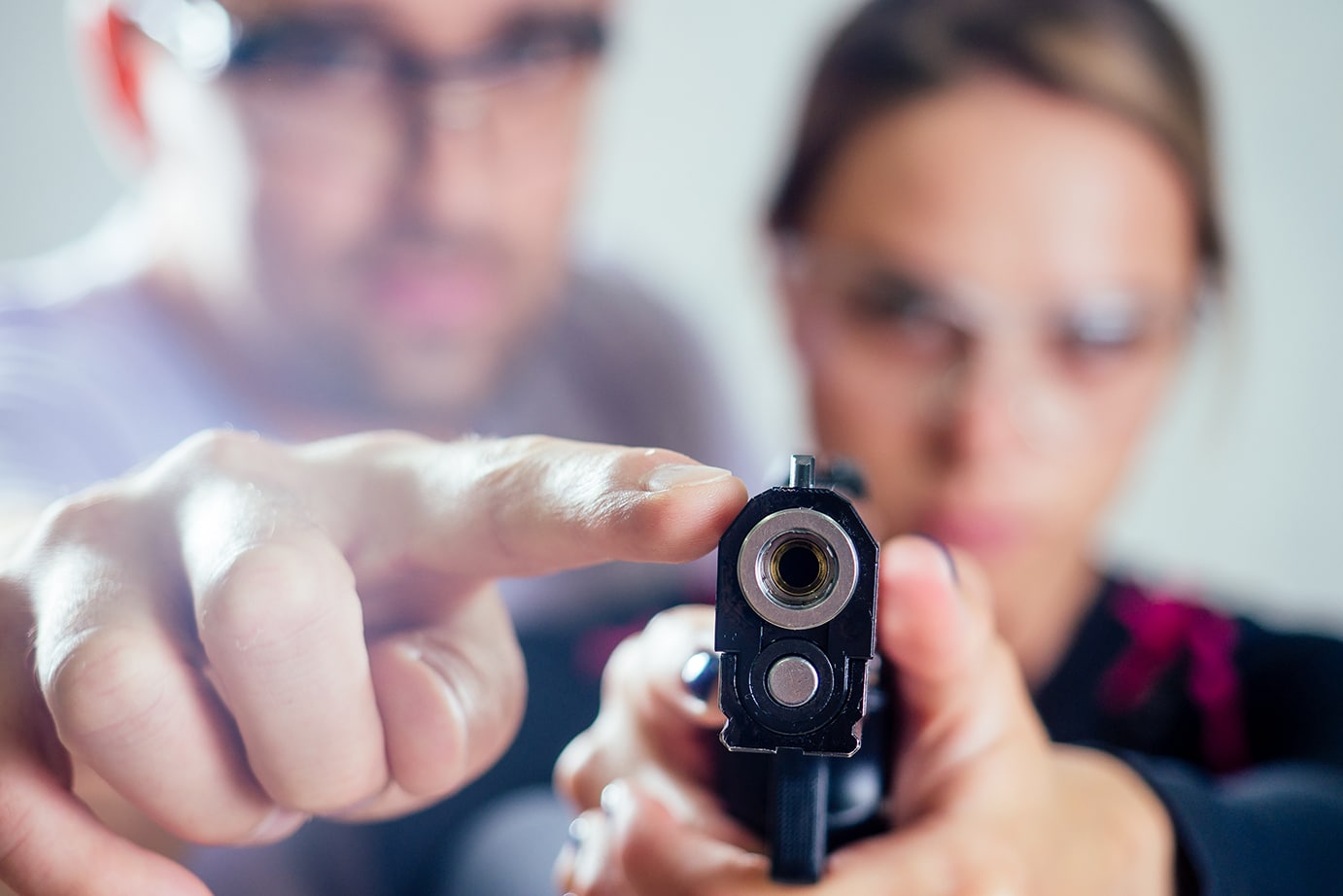 Women holding Pistol - Self Defense